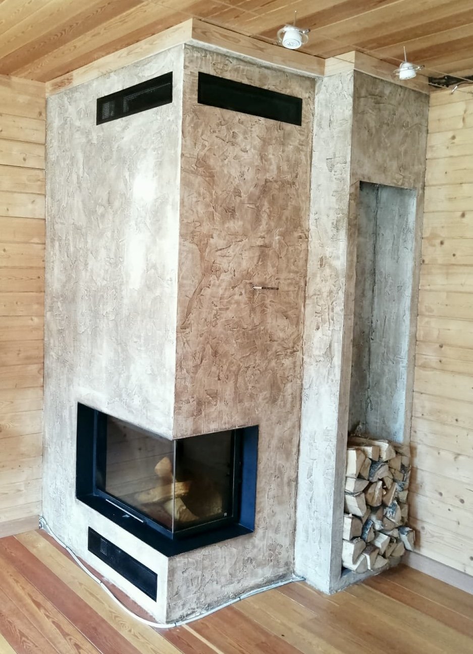 Custom stone fireplace with corner glass (Firebrick & Stone project photo)